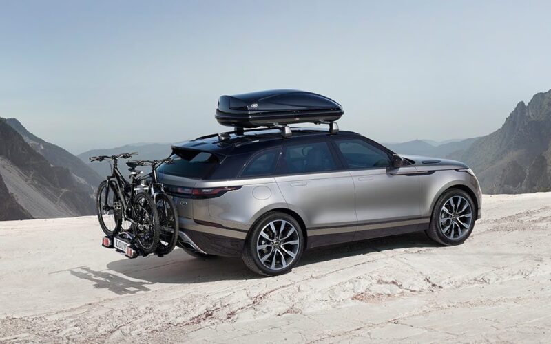 Bike rack on the back of a Range Rover.