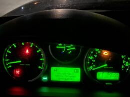 Range Rover suspension warning light on dashboard.